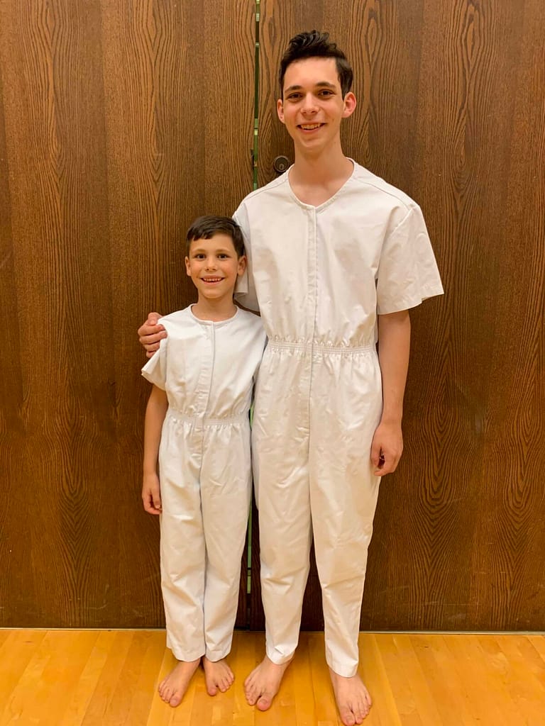 brother baptizing little brother