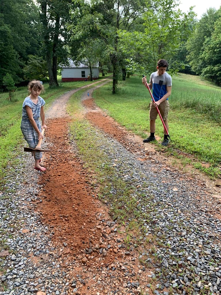 kids repairing the driveway