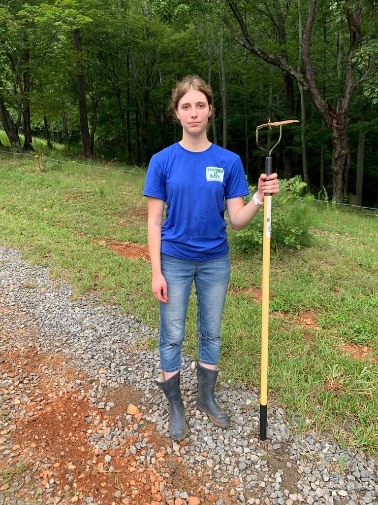 girl doing the american gothic picture
