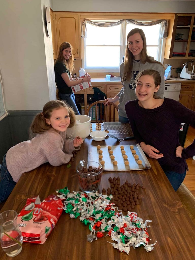4 girls making cookies