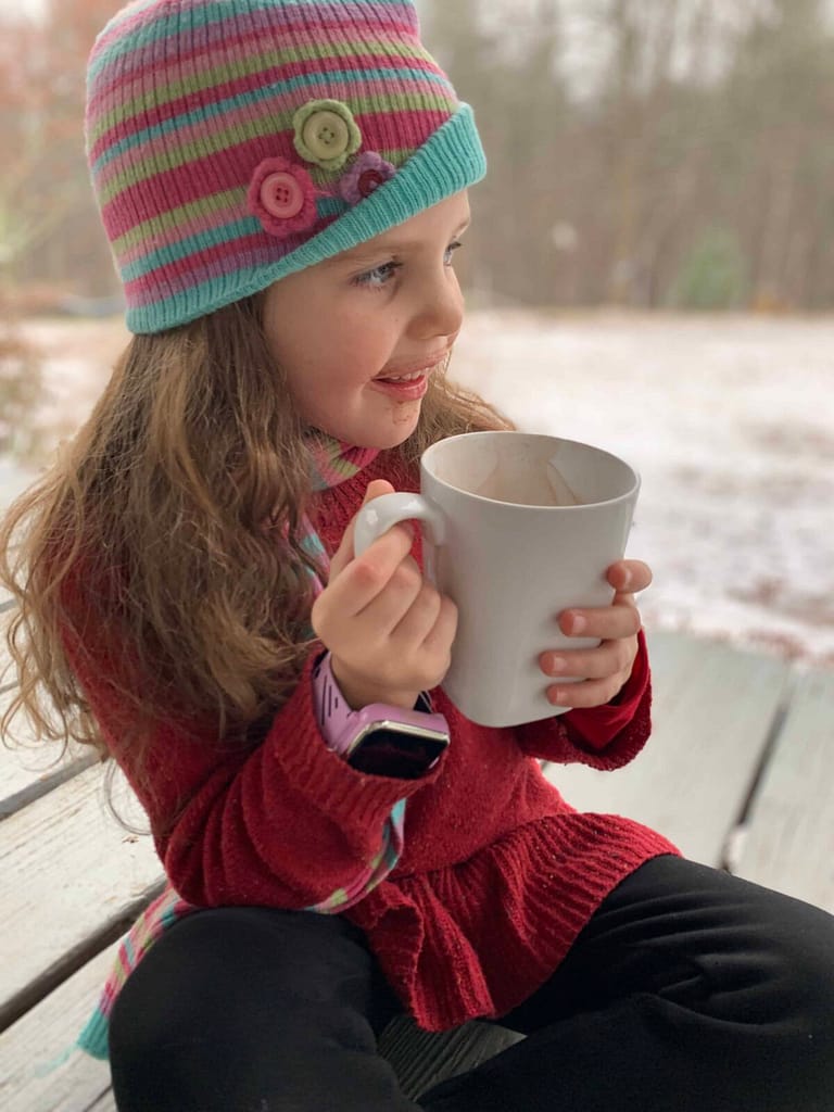 cute 6 year old drinking raw milk hot cocoa