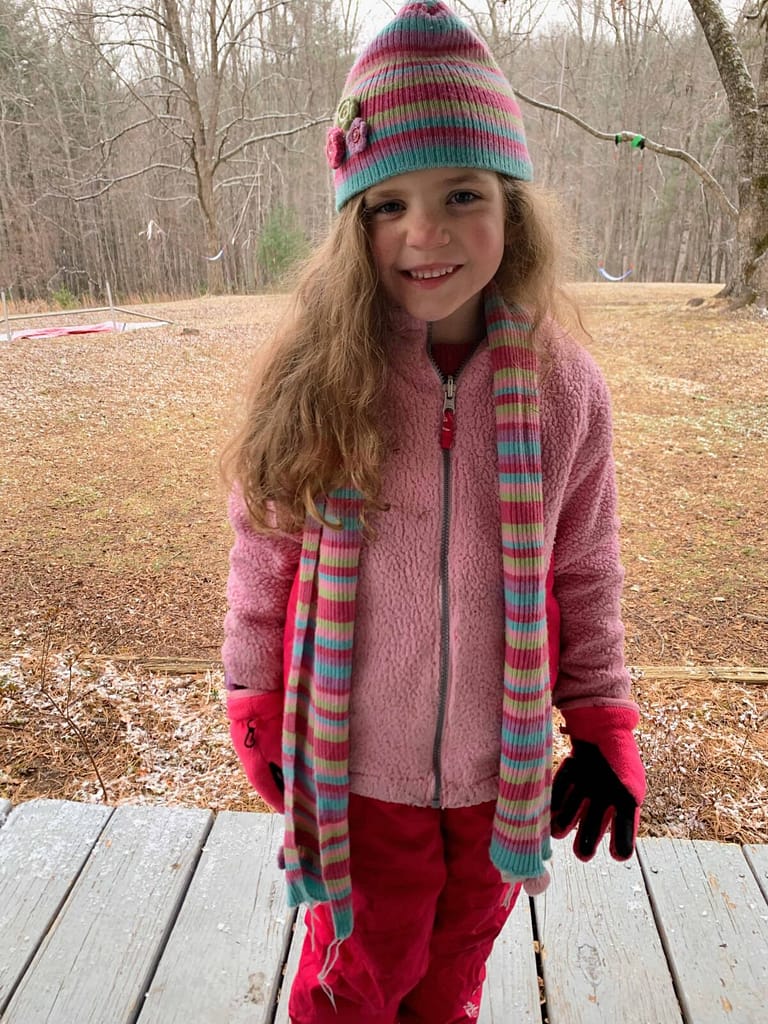 6 year old ready to play in the snow