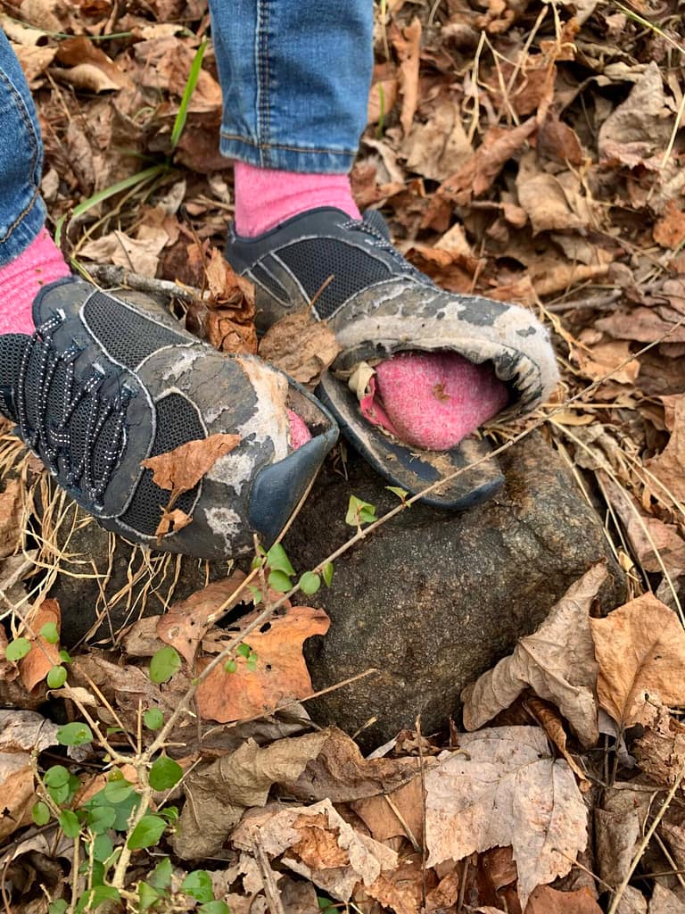 girl's holey shoes