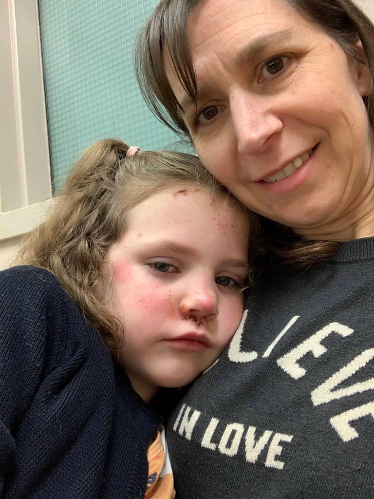 6 year old laying on Mom's chest scared