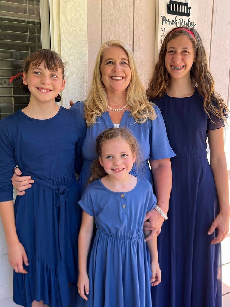 4 girls dressed up for church