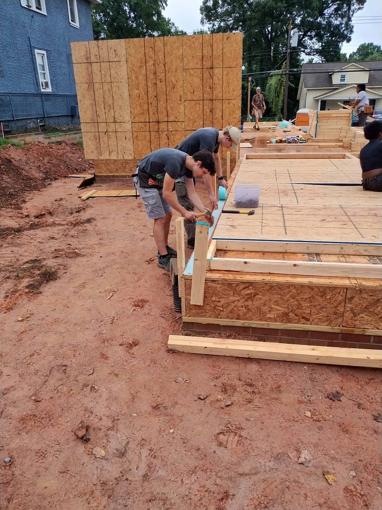 youth building a house