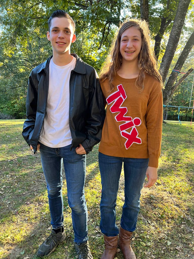 brother and sister dressed as a greaser and Twix bar for halloween