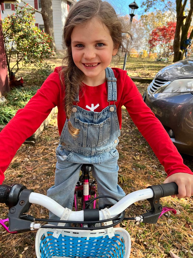 7 year old girl on a bike