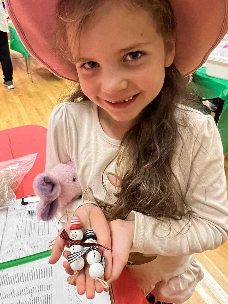 7 year old at a craft fair