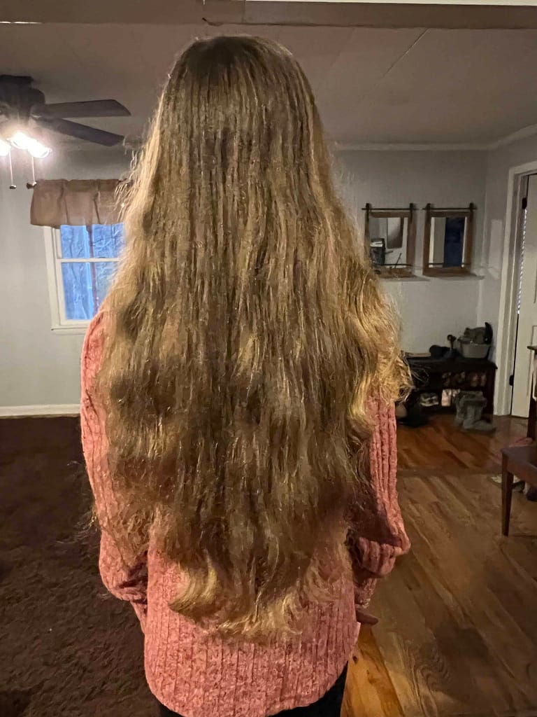 7 year old girl about to get a hair cut
