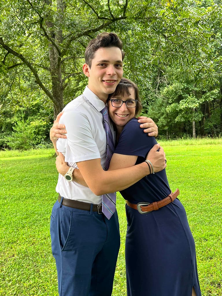mom hugging her missionary son
