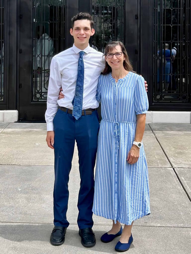 mother and teen son in Sunday clothes