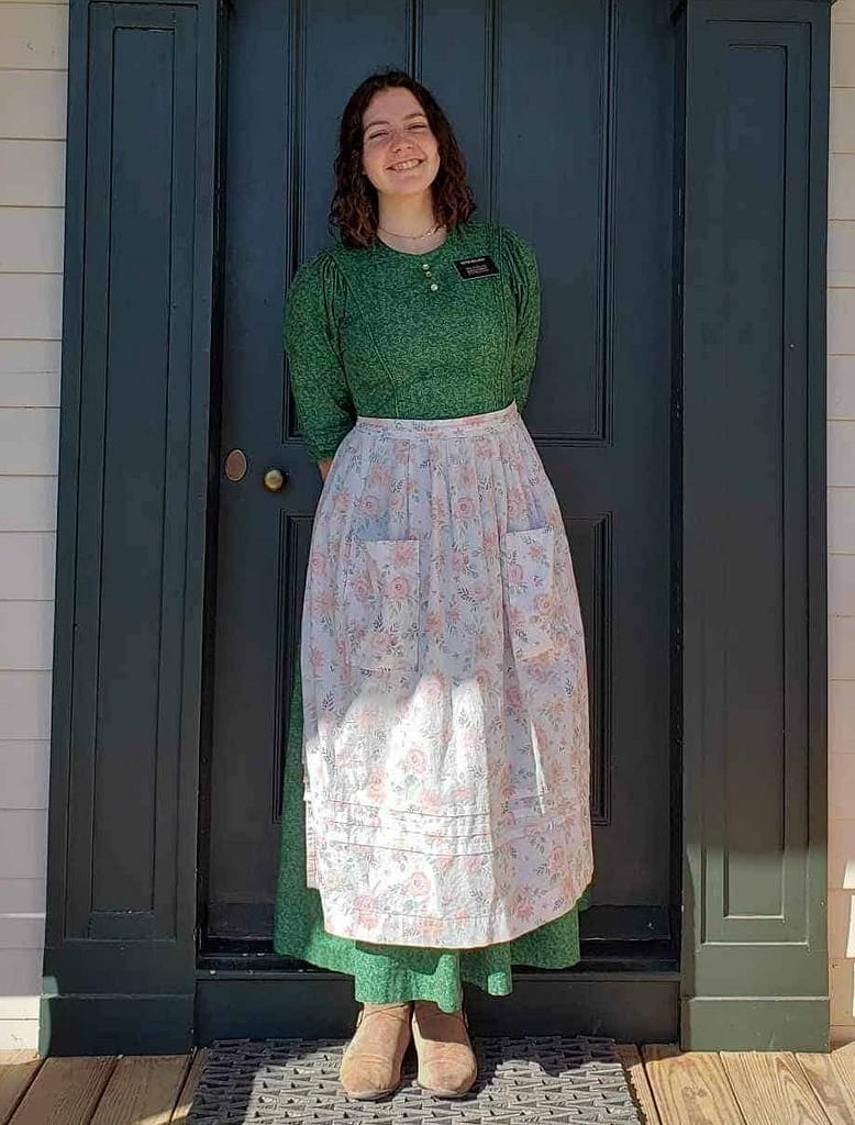 sister serving a mission in Nauvoo and giving tours
