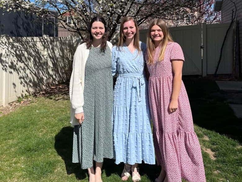 three college girls in Easter dresses