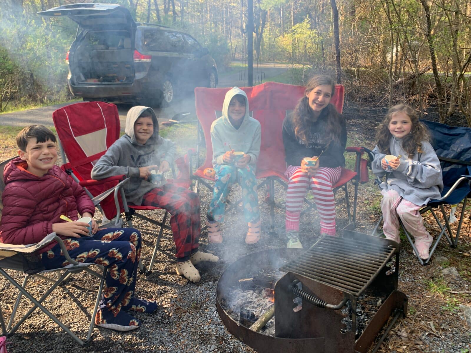 5 kids eating breakfast around the table